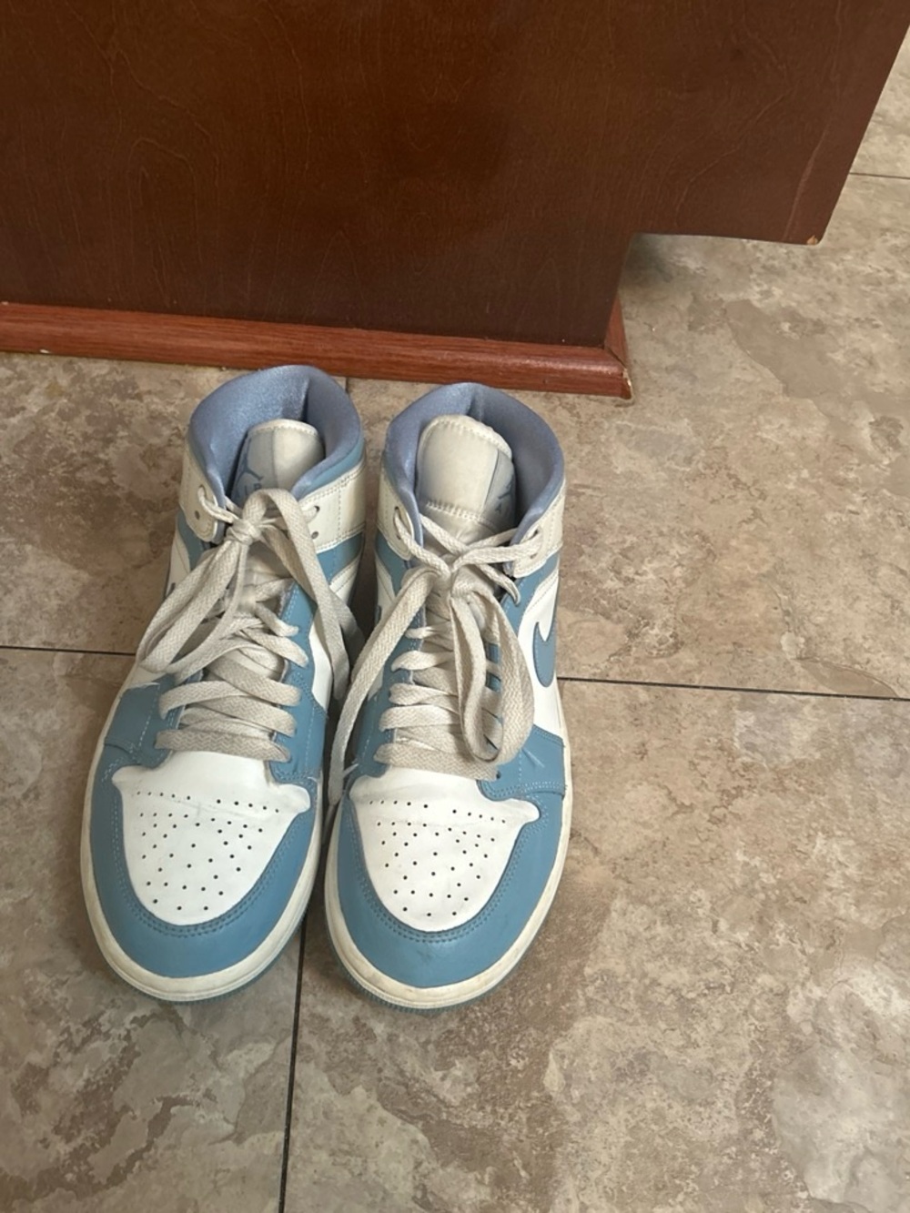 Air Jordan 1s Light Blue and White High-Top Sneakers